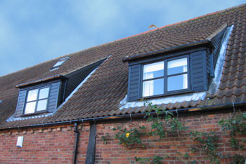 Mews house in Leicestershire with Swish black cladding, fascia and guttering